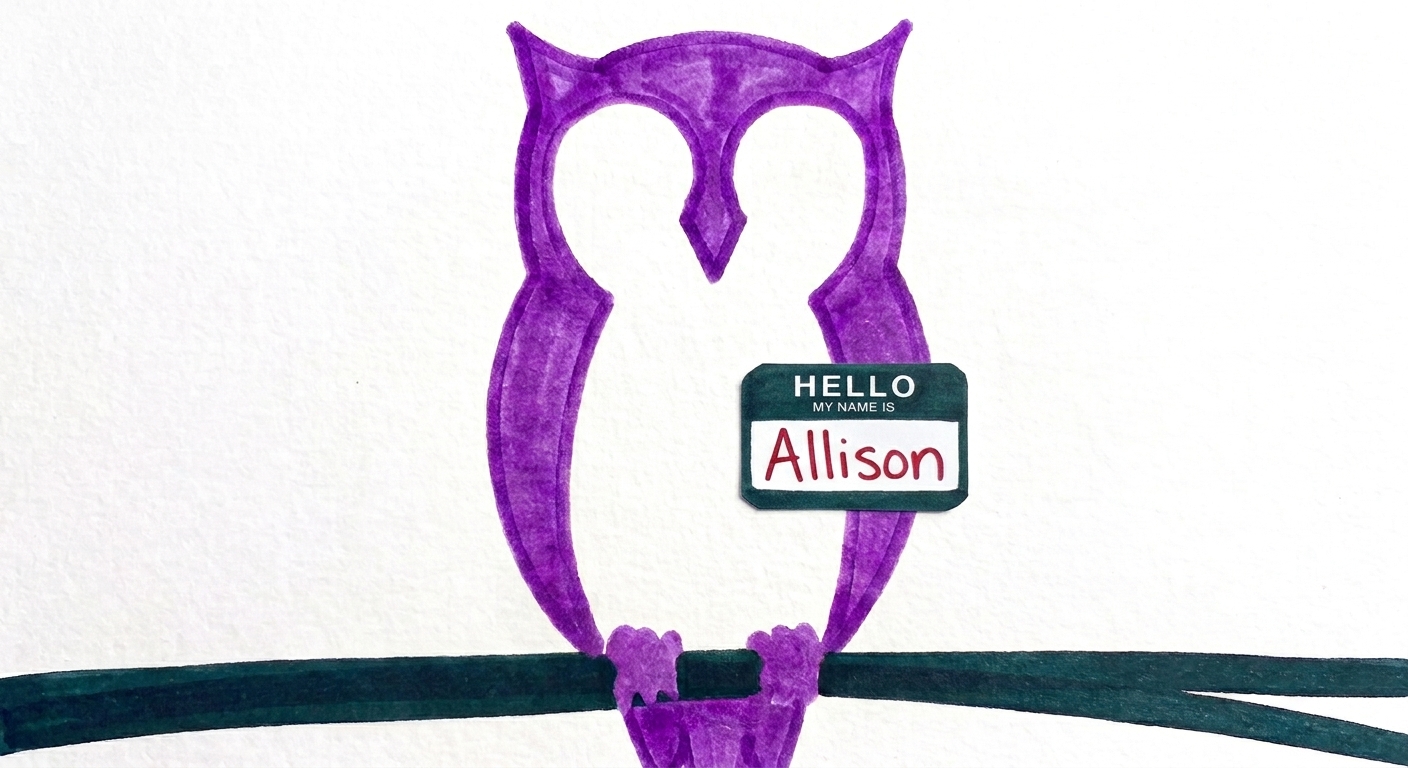 A purple owl perched on a wire, wearing a HELLO MY NAME IS Allison name tag